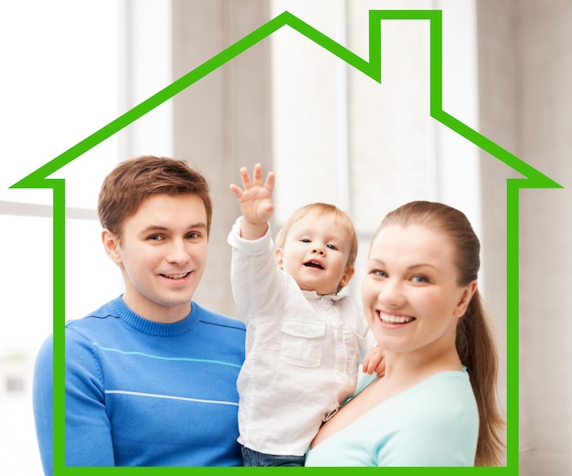 home, happiness and real estate concept - happy smiling family with adorable baby