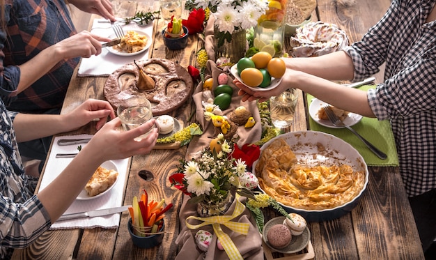 Home Holiday friends or family at the festive table