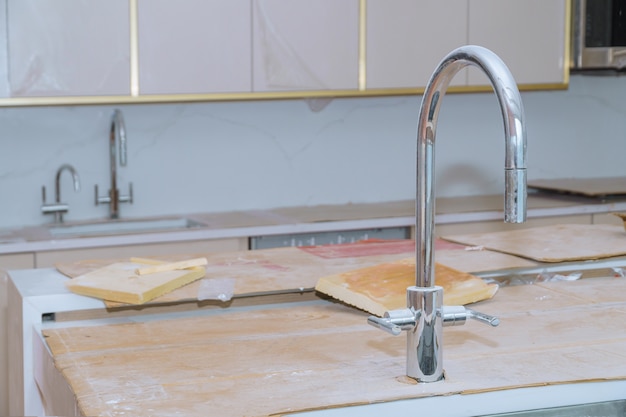 Home improvement installed in a new cabinet kitchen countertops and sink