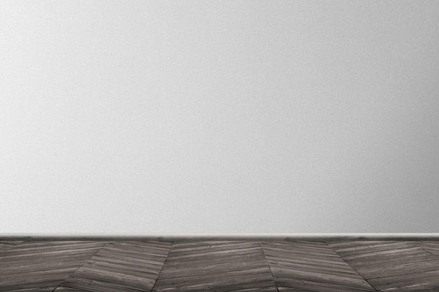 home interior of a room with parquet floor and gray wall