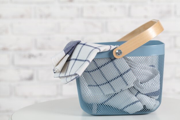 Home interior with basket for towels