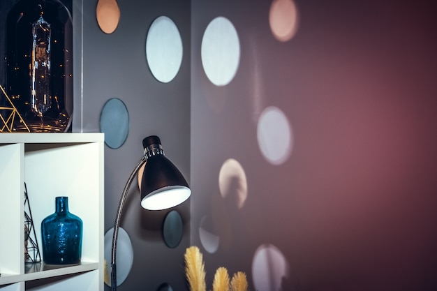 Photo home interior with shelves and lamp