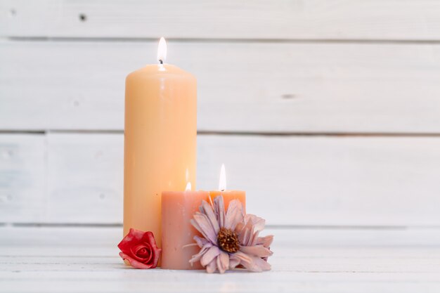 home lighting candles on wooden table