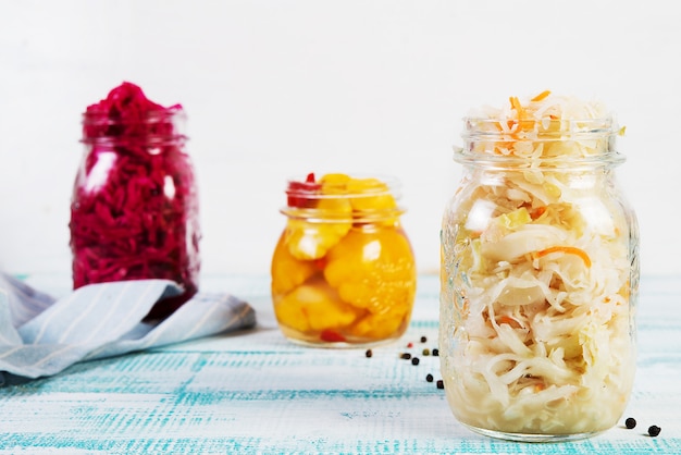 Home-made fermented vegetables in jars, cabbage, carrots, beets, squash