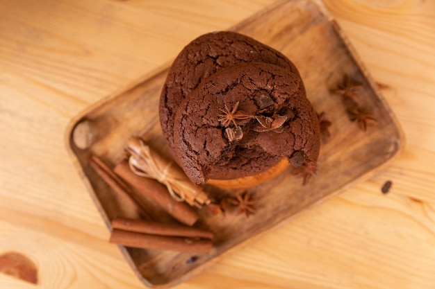 Home made giant cookies on wooden table top view