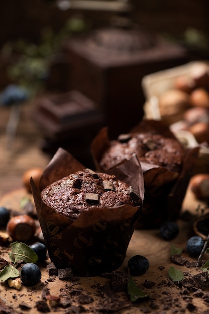 Home made muffins on wooden table