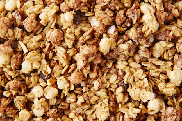 Home made musli in a bowl on black