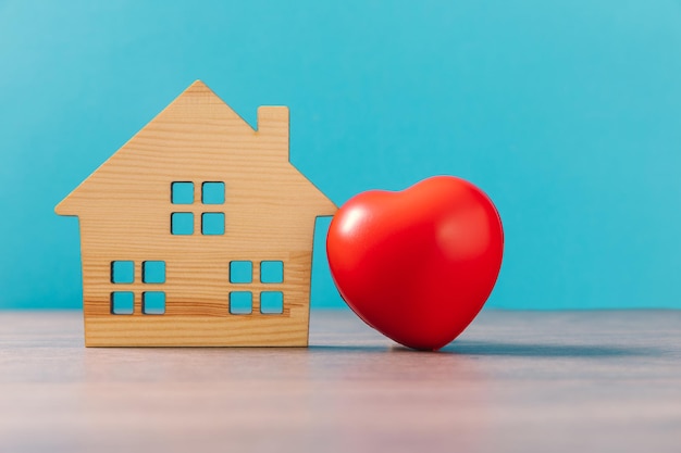 Home model with red heart