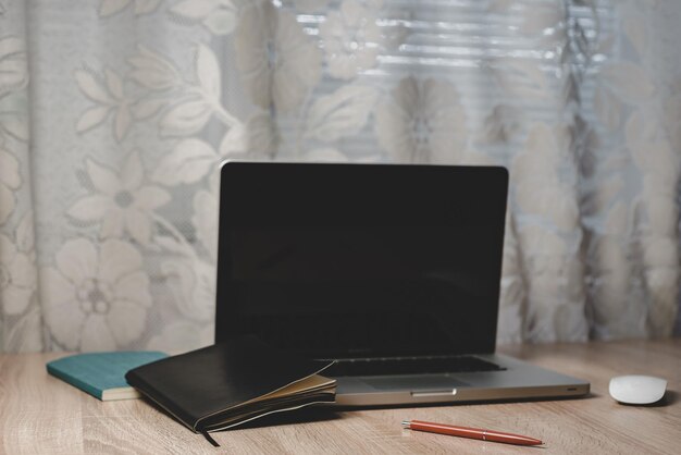 Home office and light workspace with laptop mockup on the background