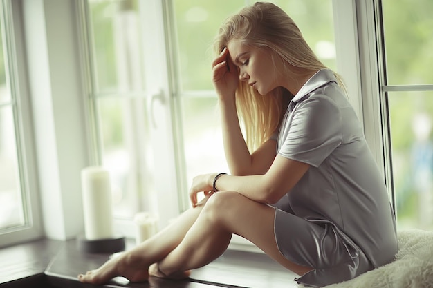 Home portrait of a young blonde girl