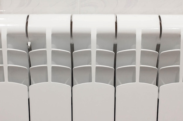 Home radiator heater on white wall