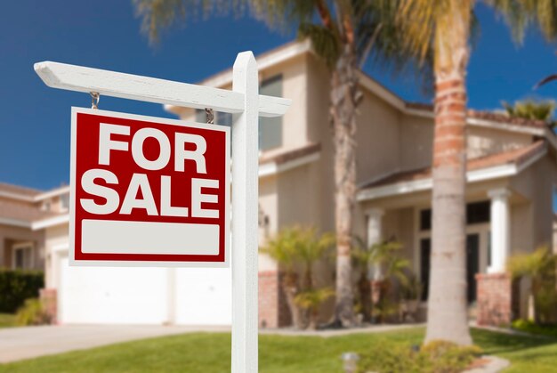 Home For Sale Sign in Front of New House