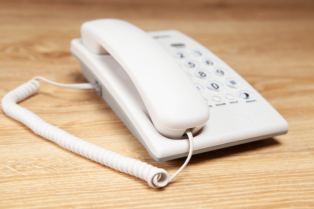 Photo home wired telephone on the table