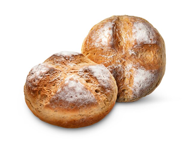 Homebaked bread. Two loaves of wheat bread isolated on a white background. Homemade baking.