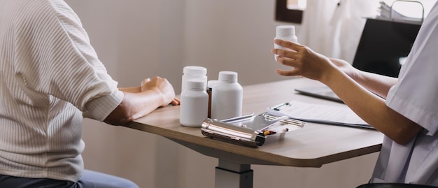 Homecare nursing service and elderly people cardiology healthcare Close up of young hispanic female doctor nurse check mature caucasian man patient heartbeat using stethoscope during visit