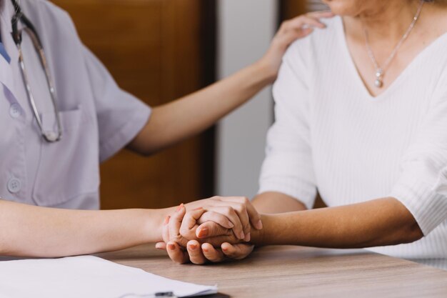 Homecare nursing service and elderly people cardiology healthcare Close up of young hispanic female doctor nurse check mature caucasian man patient heartbeat using stethoscope during visit