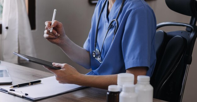 Homecare nursing service and elderly people cardiology healthcare Close up of young hispanic female doctor nurse check mature caucasian man patient heartbeat using stethoscope during visit