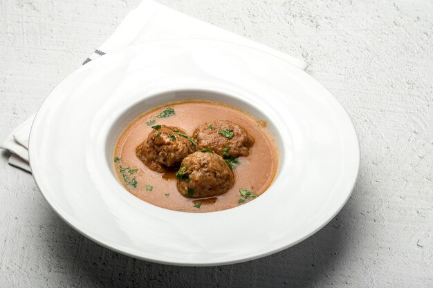 Photo homemade albondigas with spanish sauce