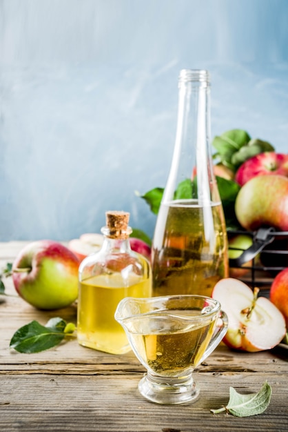 Homemade apple cider with cinnamon and anise spices, with fresh apples 