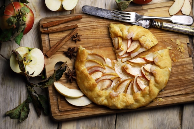 Homemade apple galette on a wooden board