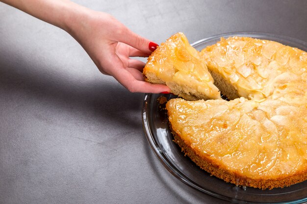 Homemade apple pie on a stone countertop.