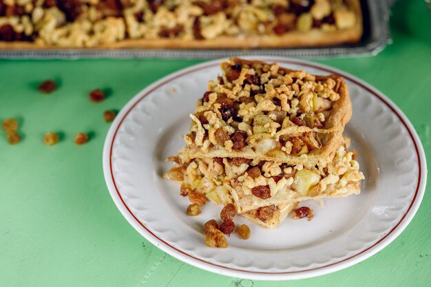 Homemade apple pie tart with raisins