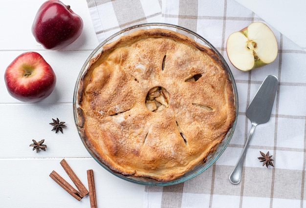 Homemade apple pie with fresh red apples