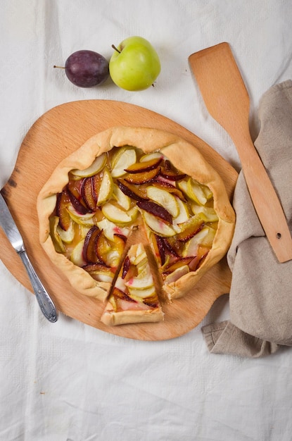 Homemade apple and plum galette table for teatime