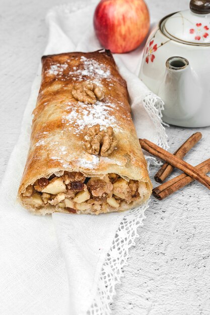 Homemade apple strudel with nuts