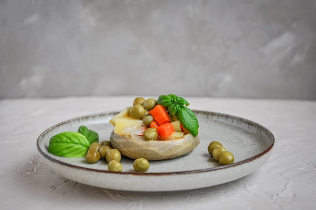 Homemade Artichoke dish with green peas carrot potatoes and basil Zeytinyagli Enginar