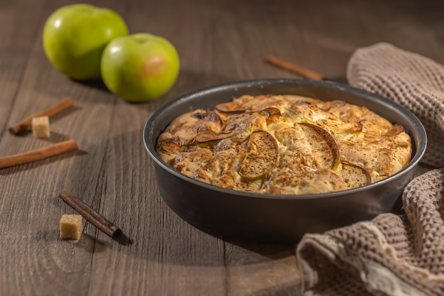 Homemade baked apple pie with cinnamon, just baked cake, thanksgiving day bake concept