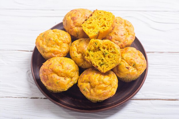 homemade baked muffins with cheese and eggs food background