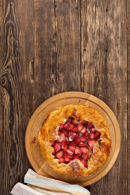 Homemade baking pie with strawberries view from above