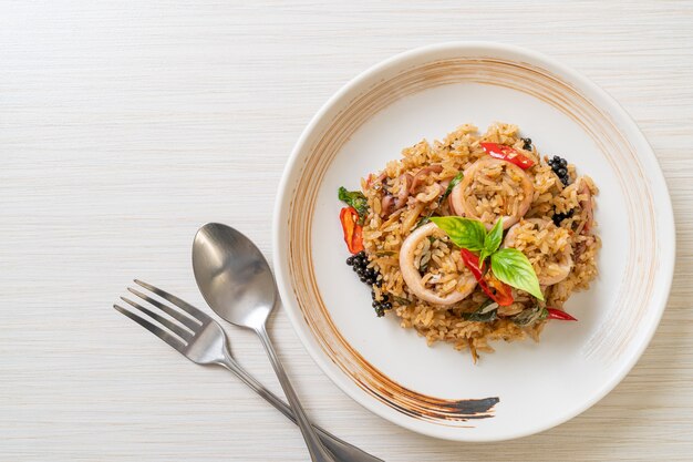 Homemade Basil and Spicy Herb Fried Rice with Squid or Octopus - Asian food style