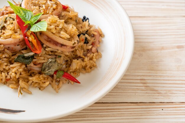 Homemade Basil and Spicy Herb Fried Rice with Squid or Octopus - Asian food style