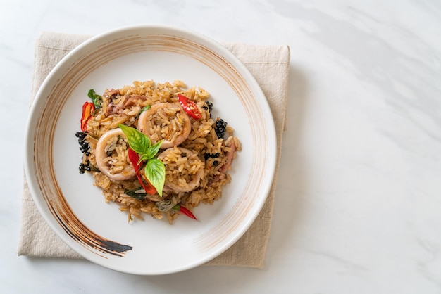 Homemade Basil and Spicy Herb Fried Rice with Squid or Octopus - Asian food style