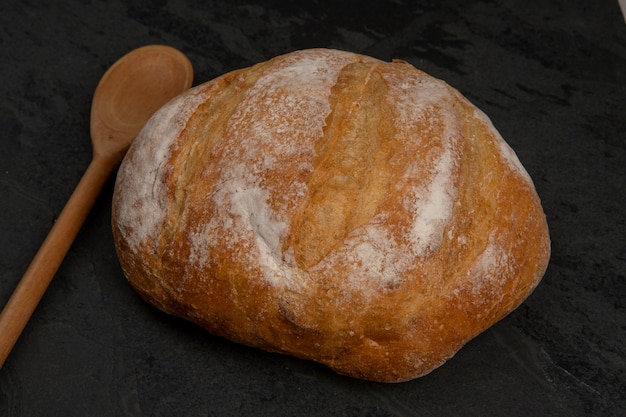 Homemade bread on black stone table