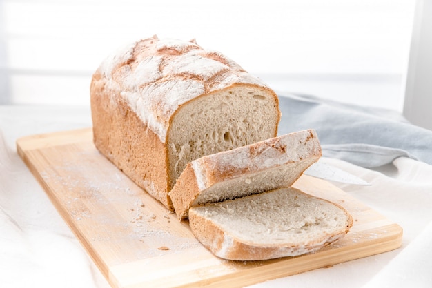 Homemade bread over cutting board