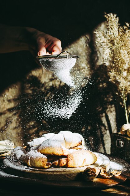 homemade buns sprinkled with powder