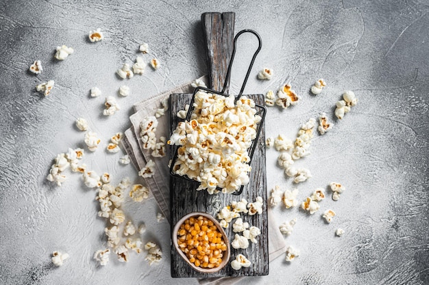 Homemade Buttered cheese popcorn in a basket White background Top view