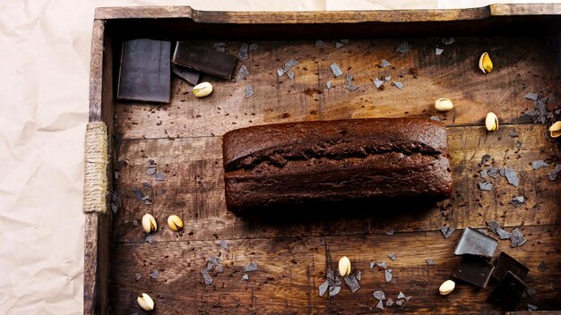 Homemade cake decorated with pistachio and chocolate