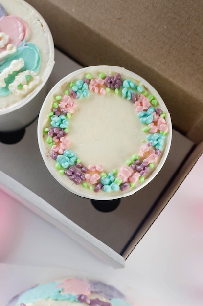 Homemade cake to go in white disposable coffee cups new confectionery trend