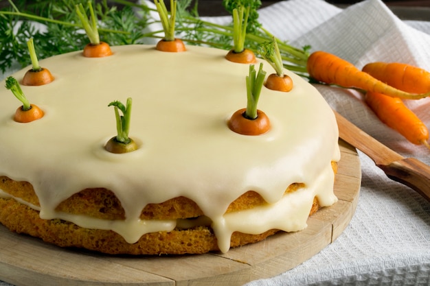 Homemade cake. traditional carrot cake with cream.