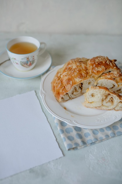 homemade cakes, rustic style, sweet pie on a light background, fresh bread