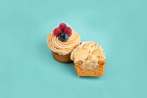 Homemade cakes with cream and berries