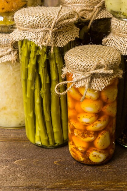 Homemade canned organic vegetables in glass jars.