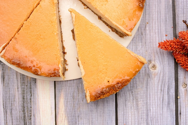 Homemade cheese pie on wooden table