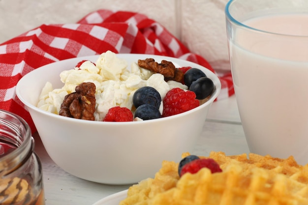 Homemade cheese with berries and nuts breakfast food