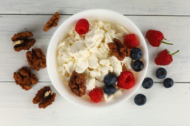 Homemade cheese with berries and nuts breakfast food