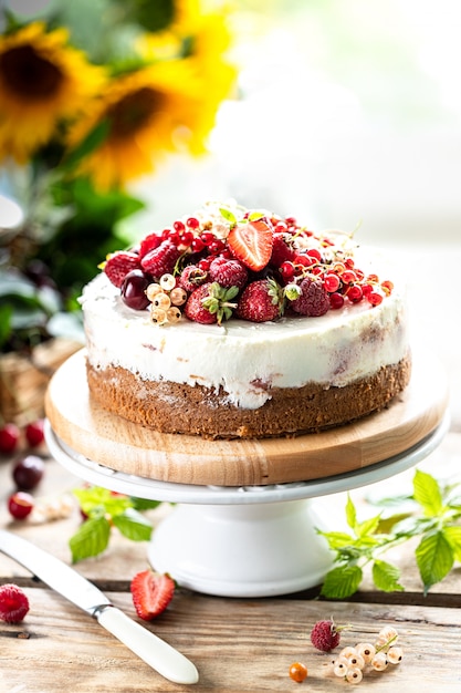 Homemade cheesecake made from mixed fresh berries, selective focus. vertical. copy space